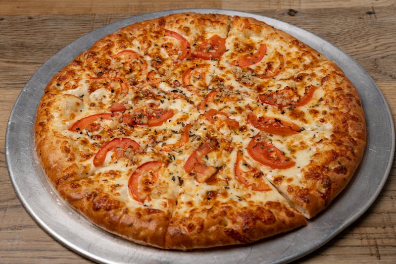 Hawaiian pizza with pineapple and ham